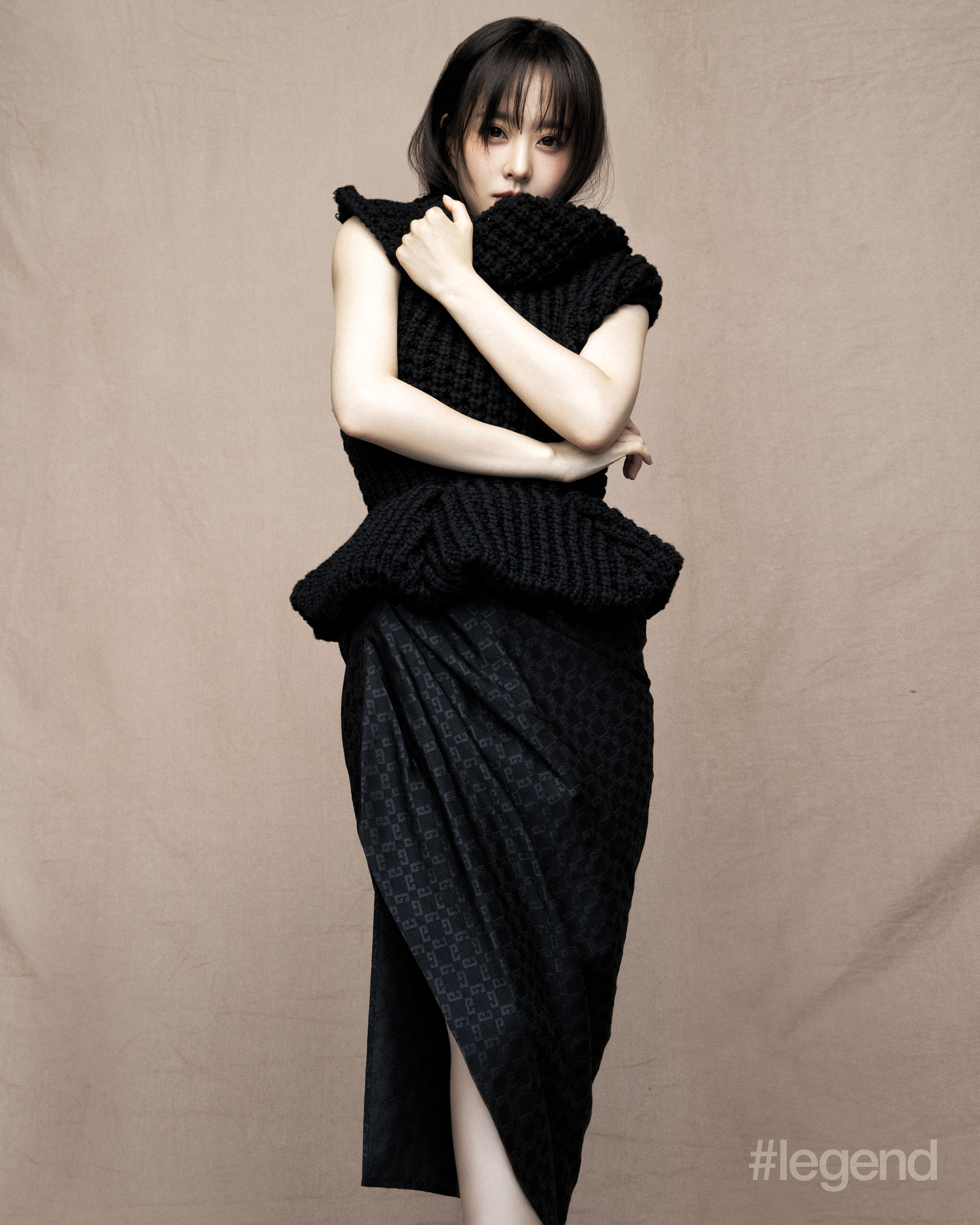 Black chunky sleeveless knit top, gathered skirt and leather slingbacks _ Givenchy