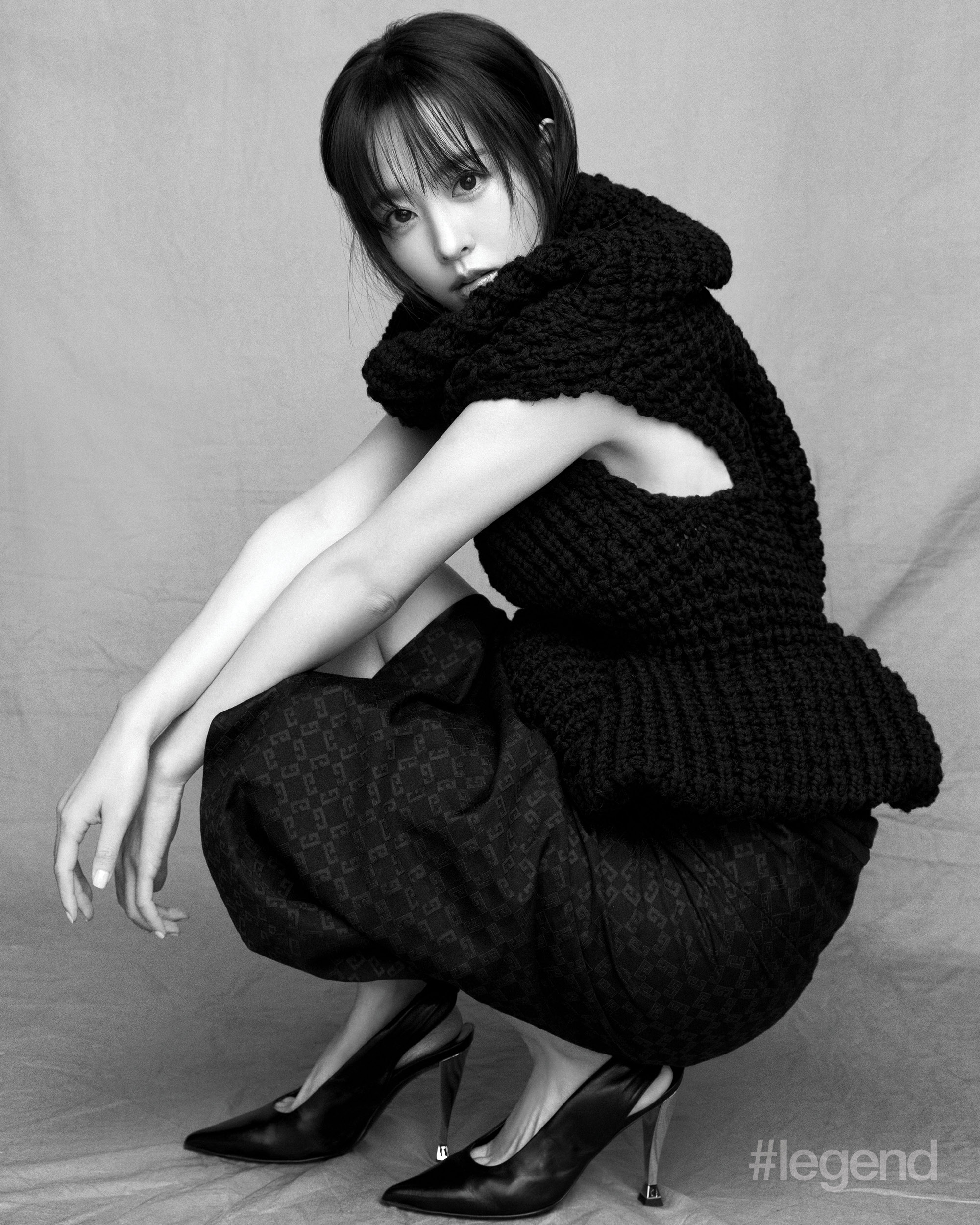 Black chunky sleeveless knit top, gathered skirt and leather slingbacks _ Givenchy
