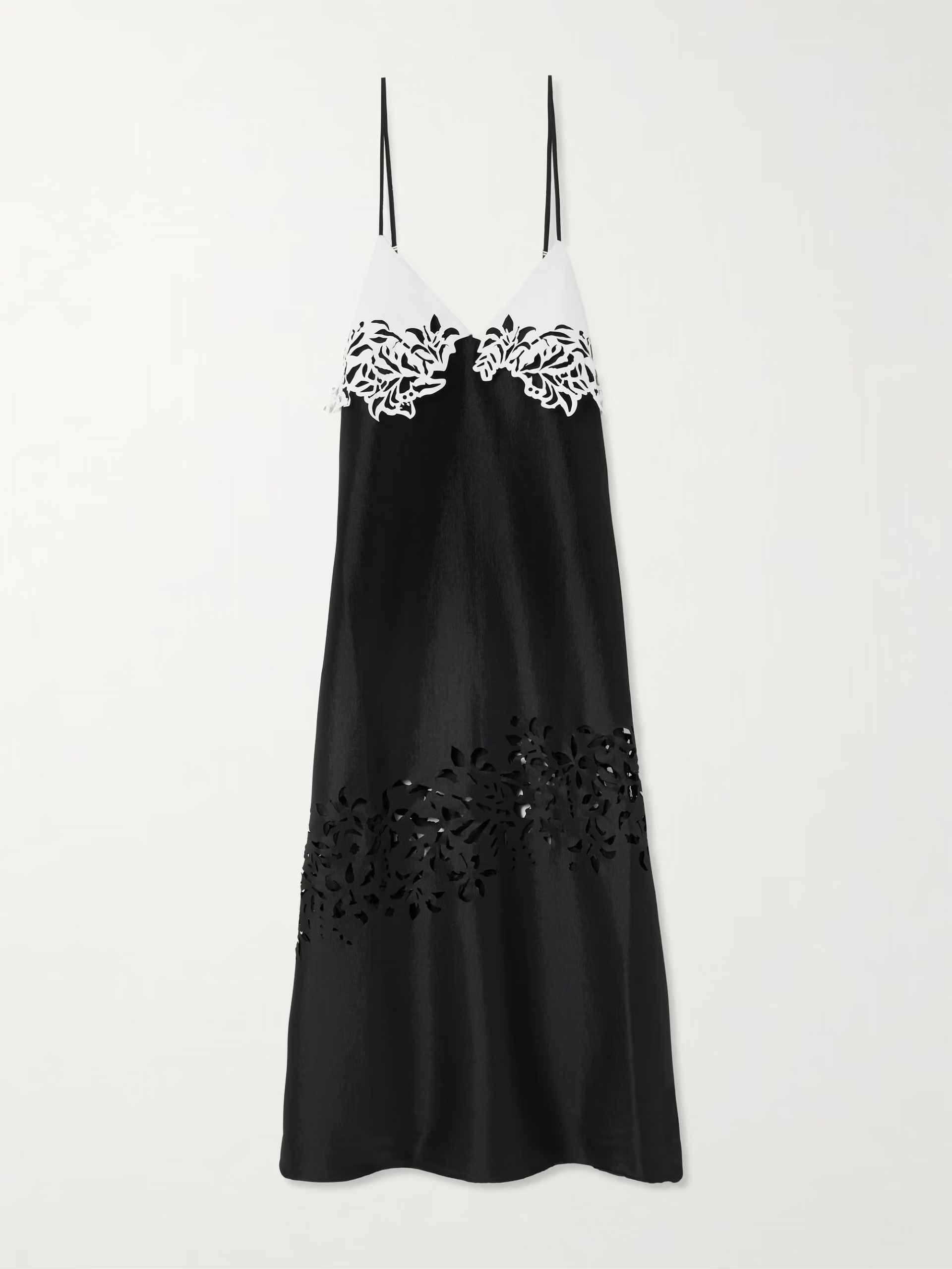 Black and white laser-cut maxi dress _ Kiki Vargas from Net-A-Porter; Black leather top handle bag _ Jacquemus from Harvey Nichols; White knotted leather sandals _ Gianvito Rossi