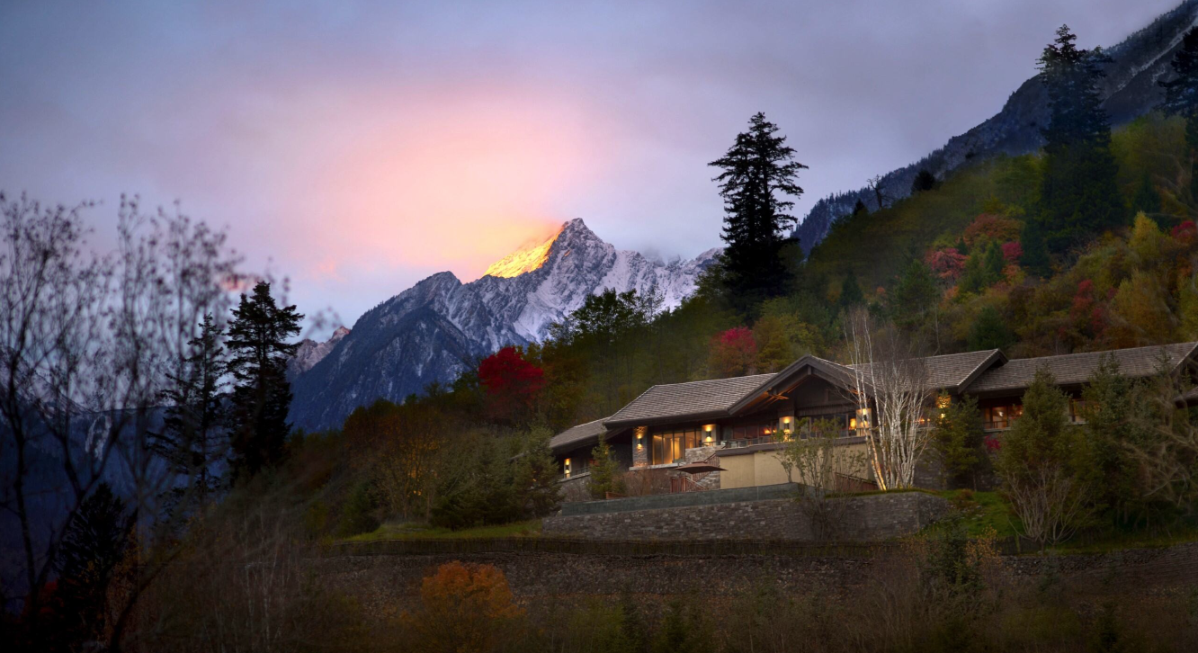An exterior shot of the three-bedroom villa at sunset.