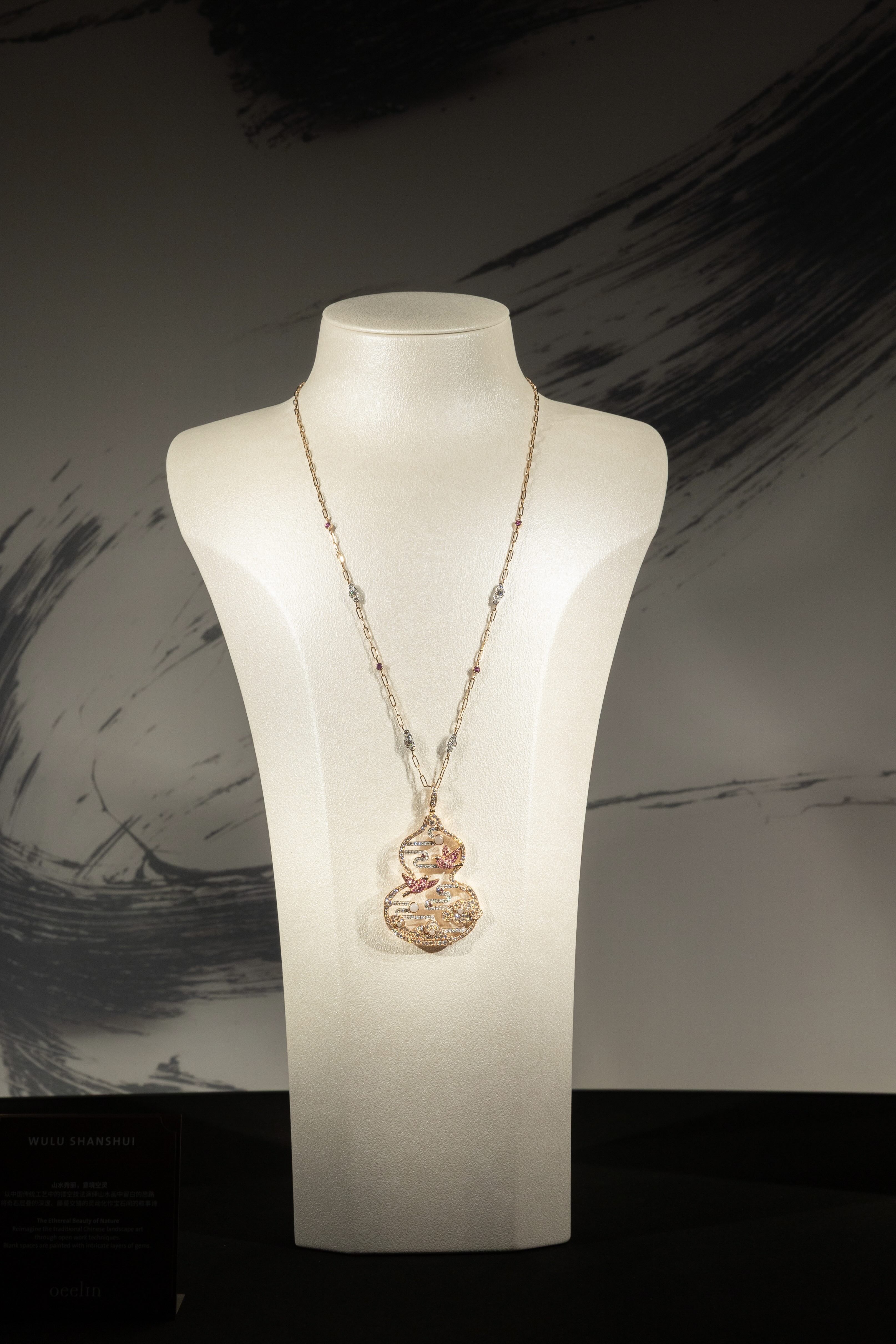 The Wulu Fairy collection piece (left) and the Shanshui Fine Jewellery necklace