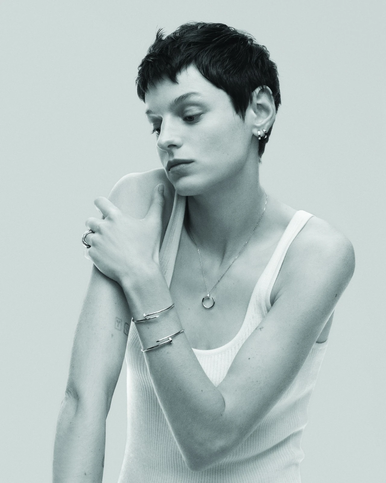 Juste un Clou necklace: Yellow gold; diamonds. Juste un Clou bracelet: Small model; yellow gold; diamonds. Juste un Clou bracelet: Small model; yellow gold. LOVE earrings: Classic model; yellow gold. Trinity ring: Medium model; white gold, pink gold and yellow gold; diamonds.