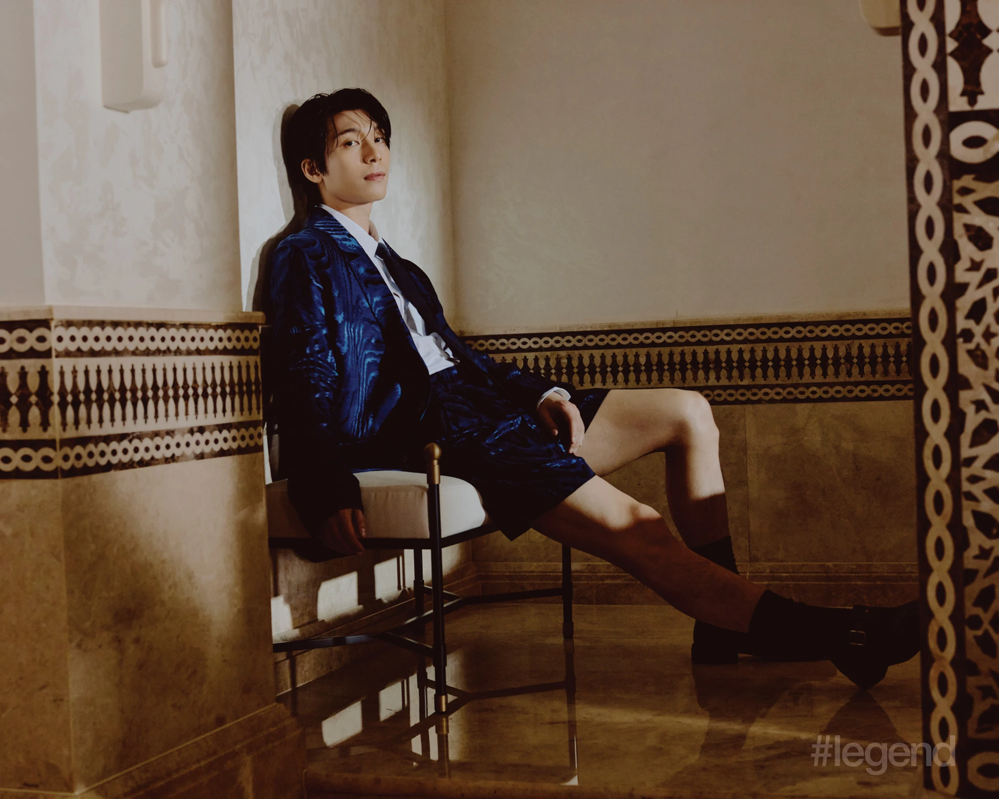 Blue printed blazer and shorts, white shirt, and black leather shoes and tie _ Louis Vuitton (Stylist’s own socks); THE MANSION, MGM COTAI