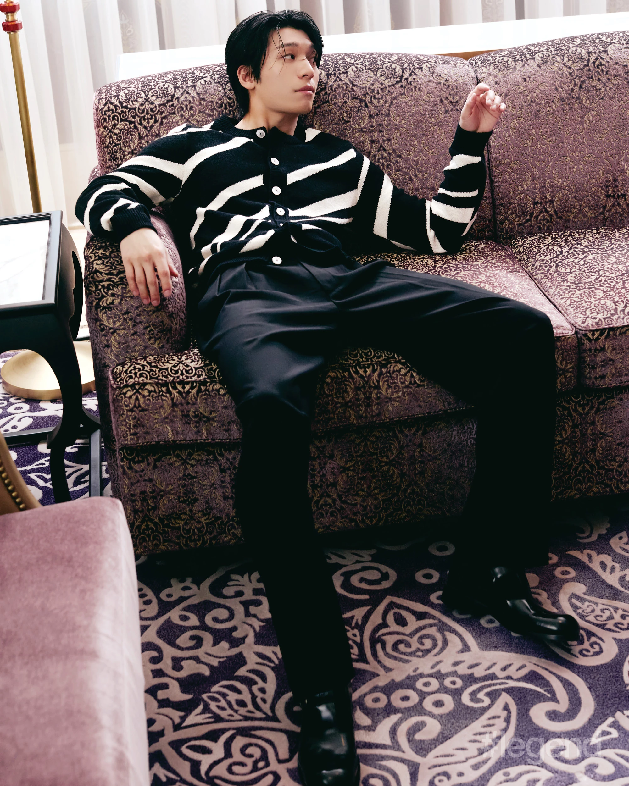Black and white striped cardigan and black trousers _ Dolce&Gabbana Black leather shoes _ Louis Vuitton; THE MANSION, MGM COTAI
