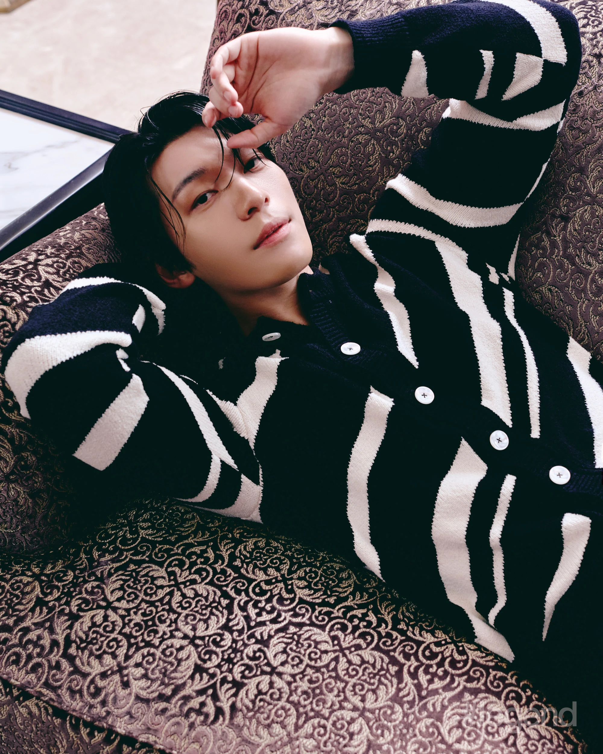 Black and white striped cardigan and black trousers _ Dolce & Gabbana; THE MANSION, MGM COTAI