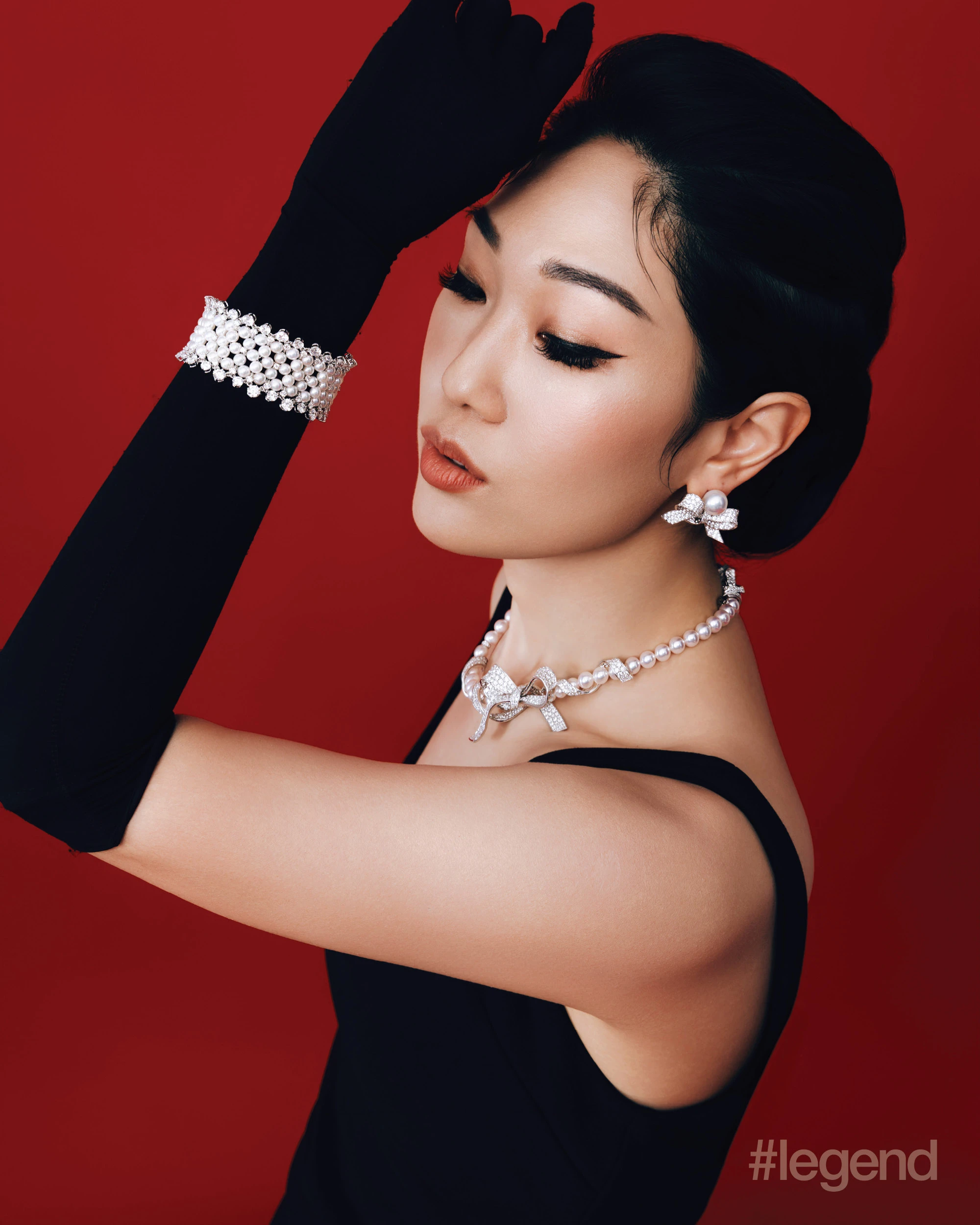 The Bows necklace in 18K white gold with Akoya cultured pearls and diamonds, and earrings in 18K white gold with white South Sea cultured pearls and diamonds, and High Jewellery Collection bracelet in 18K white gold with Akoya cultured pearls and diamonds _ Mikimoto