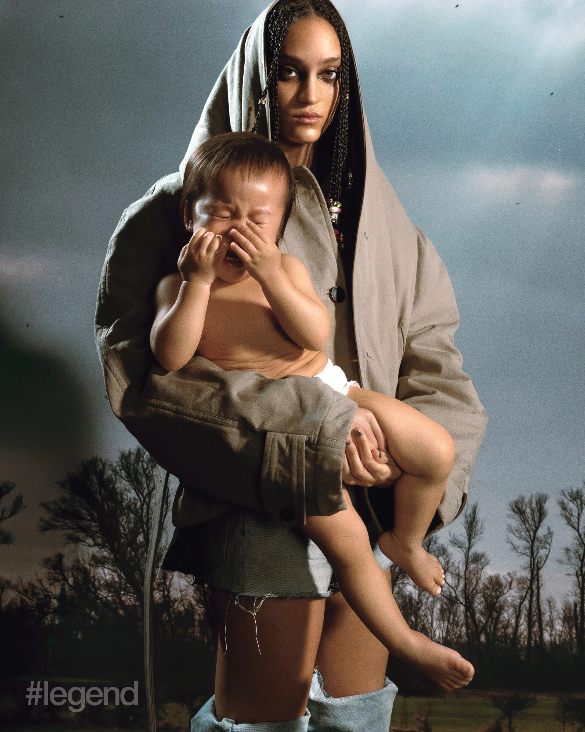 Beige hooded jacket, and denim shorts and boots _ Balenciaga