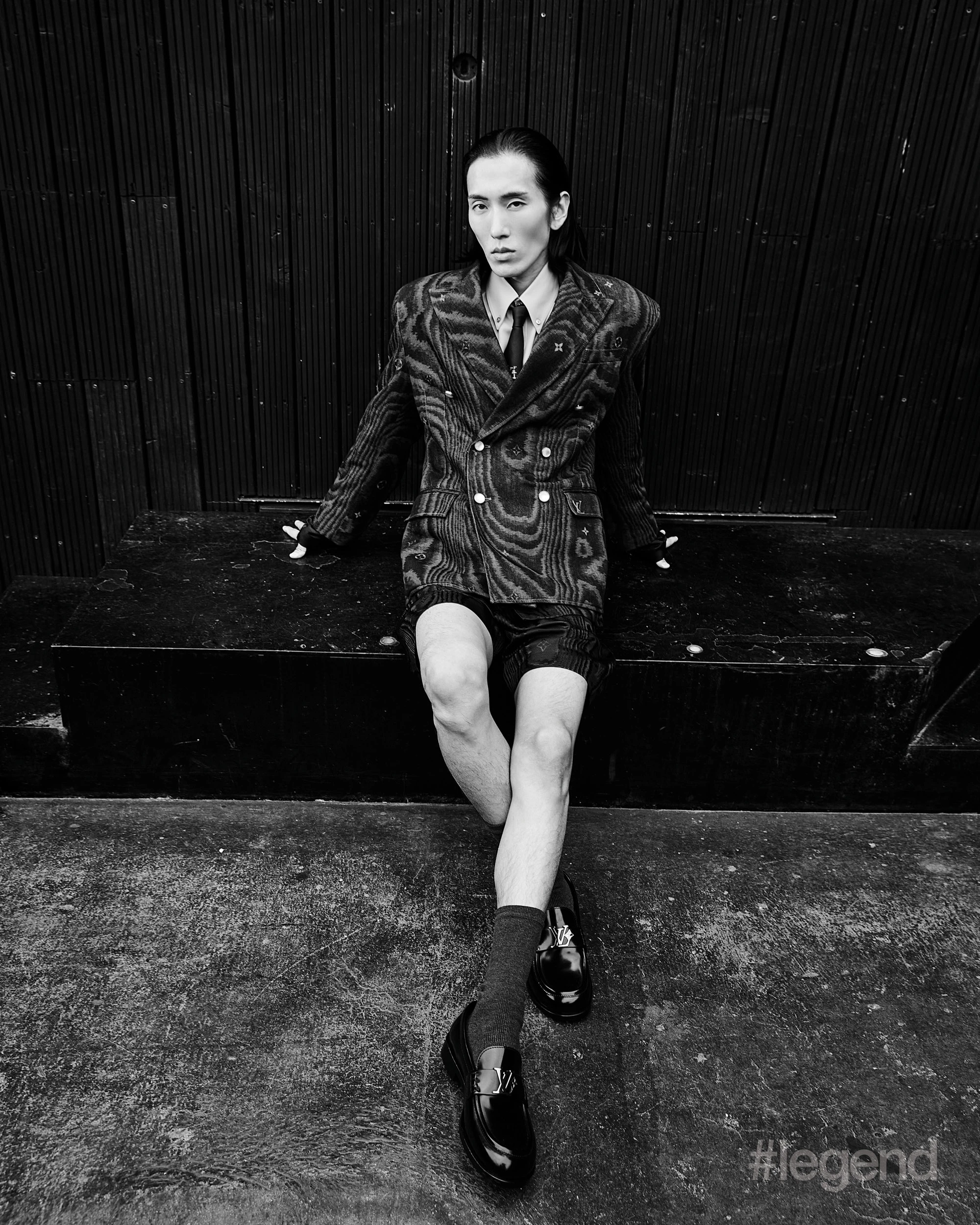 White shirt _ Fendi; Black blazer, shorts and shoes _ Louis Vuitton