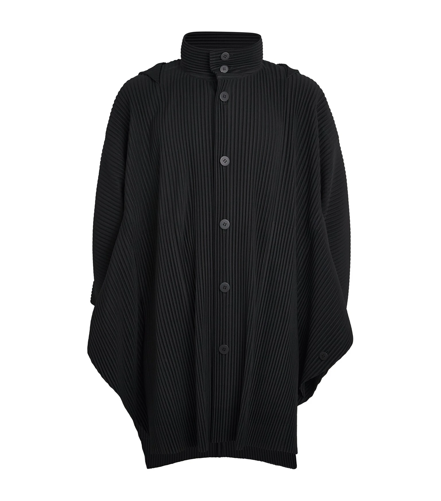Beige cotton and silk cape trench coat _ Bottega Veneta; Black pleated cape coat _ Homme Plissé Issey Miyake from Harrods; White T-shirt _ The Row from Mr Porter; Cuffed denim jeans _ Jacquemus; Black suede and canvas sneakers _ Hermès