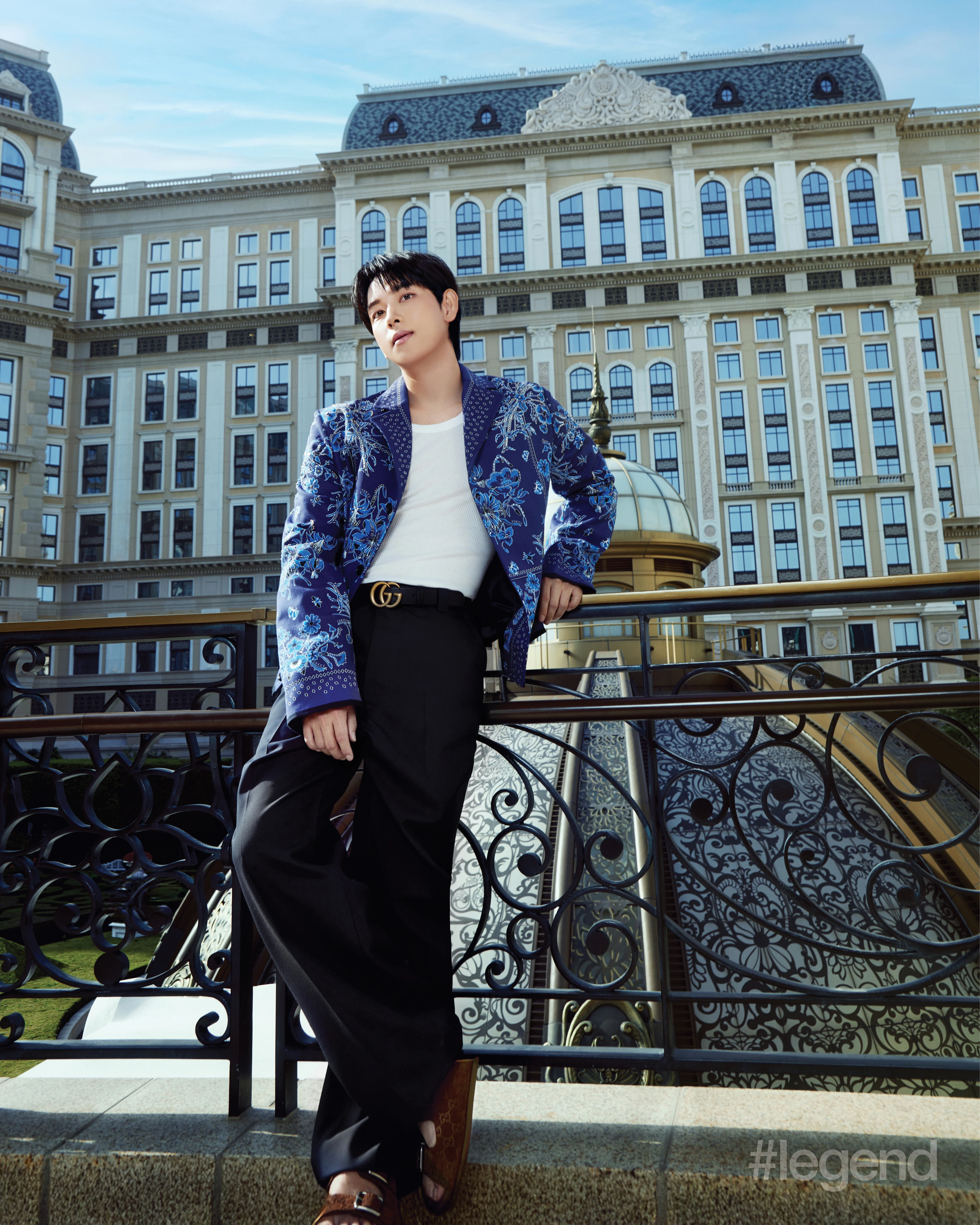 Blue printed blazer, black trousers and leather belt, and red sandals _ Gucci (Stylist’s own vest); Jardim Secreto, Grand Lisboa Palace Resort Macau