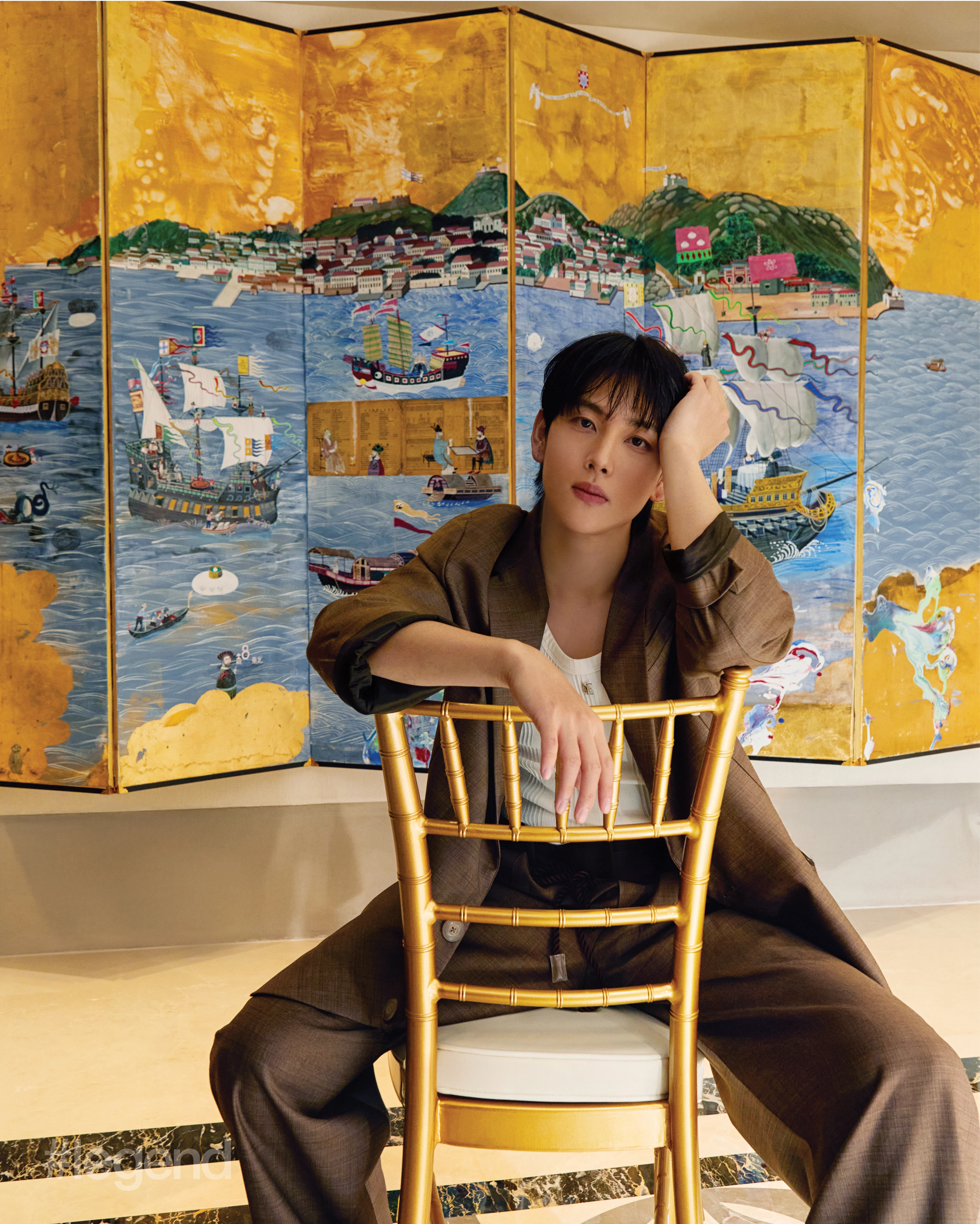 Brown blazer and trousers _ Emporio Armani (Stylist’s own vest); Meeting Rooms, Grand Lisboa Palace Resort Macau