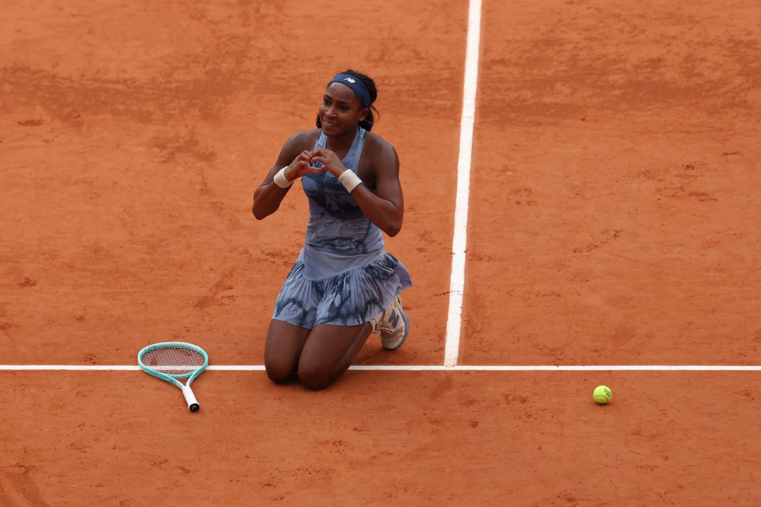 Coco Gauff shows her love and gratitude to the crowd.
