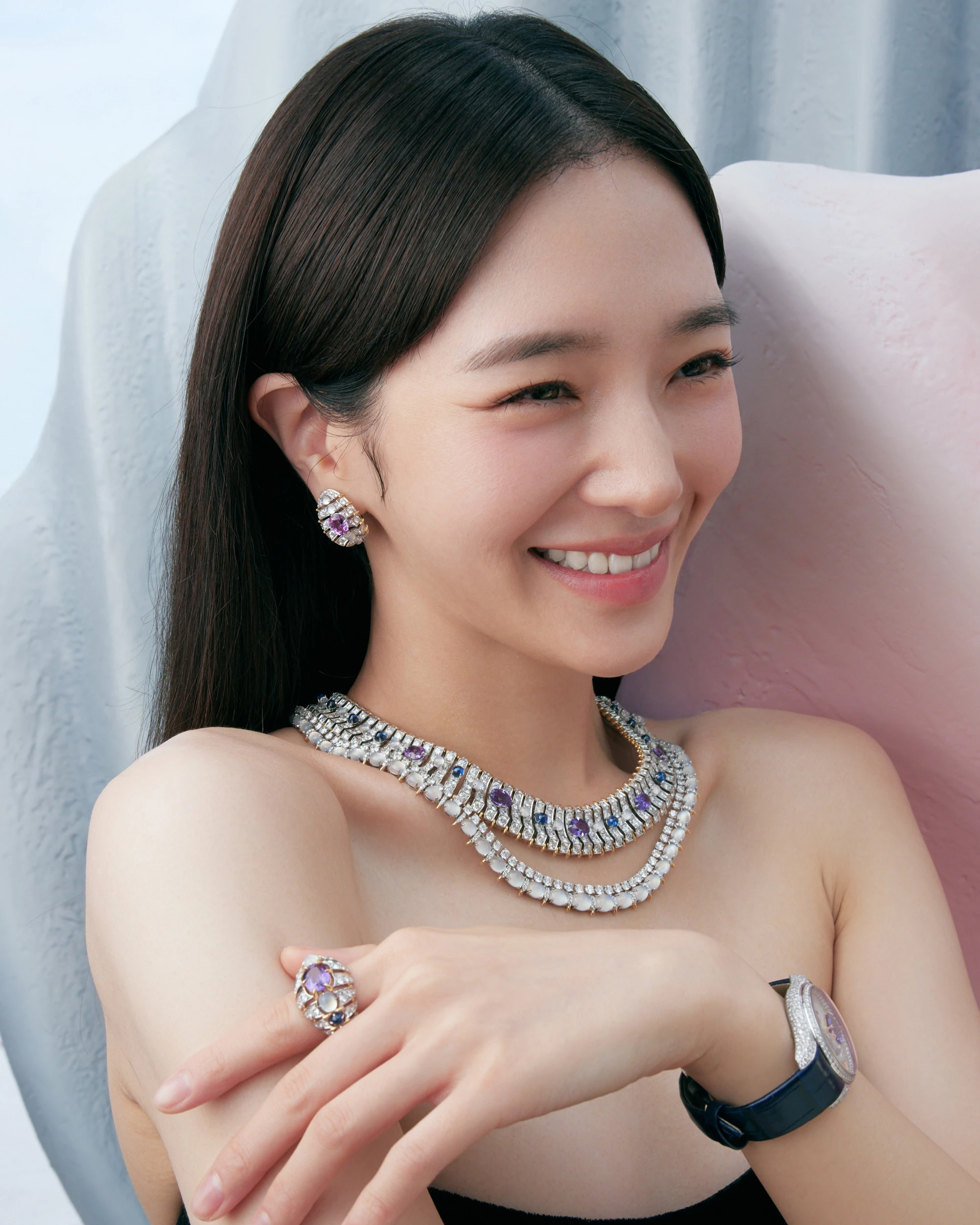 Park wears Seahorse earrings in platinum and 18k yellow gold with purple sapphires, moonstones and diamonds, and necklace and ring in platinum and 18k yellow gold with purple and blue sapphires, moonstones and diamonds, and Bird on a Rock Legacy watch in 18k white gold with diamonds, all by Tiffany & Co.
