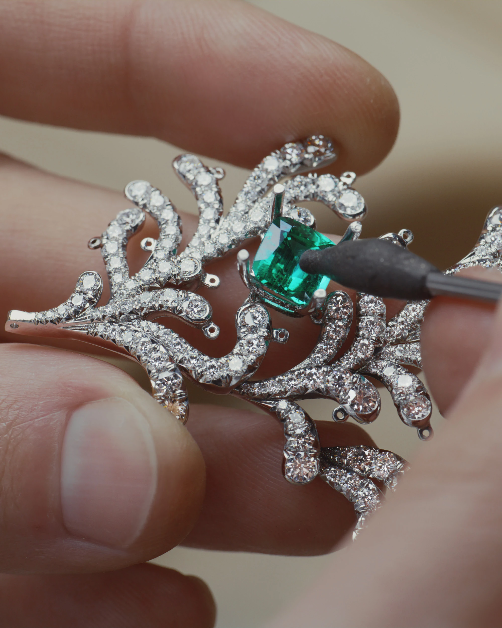 A display of Seahorse pieces inspired by Jean Schlumberger’s famed 1968 seahorse brooches, and the making of the Ocean Flora necklace with magnificent Zambian emeralds.