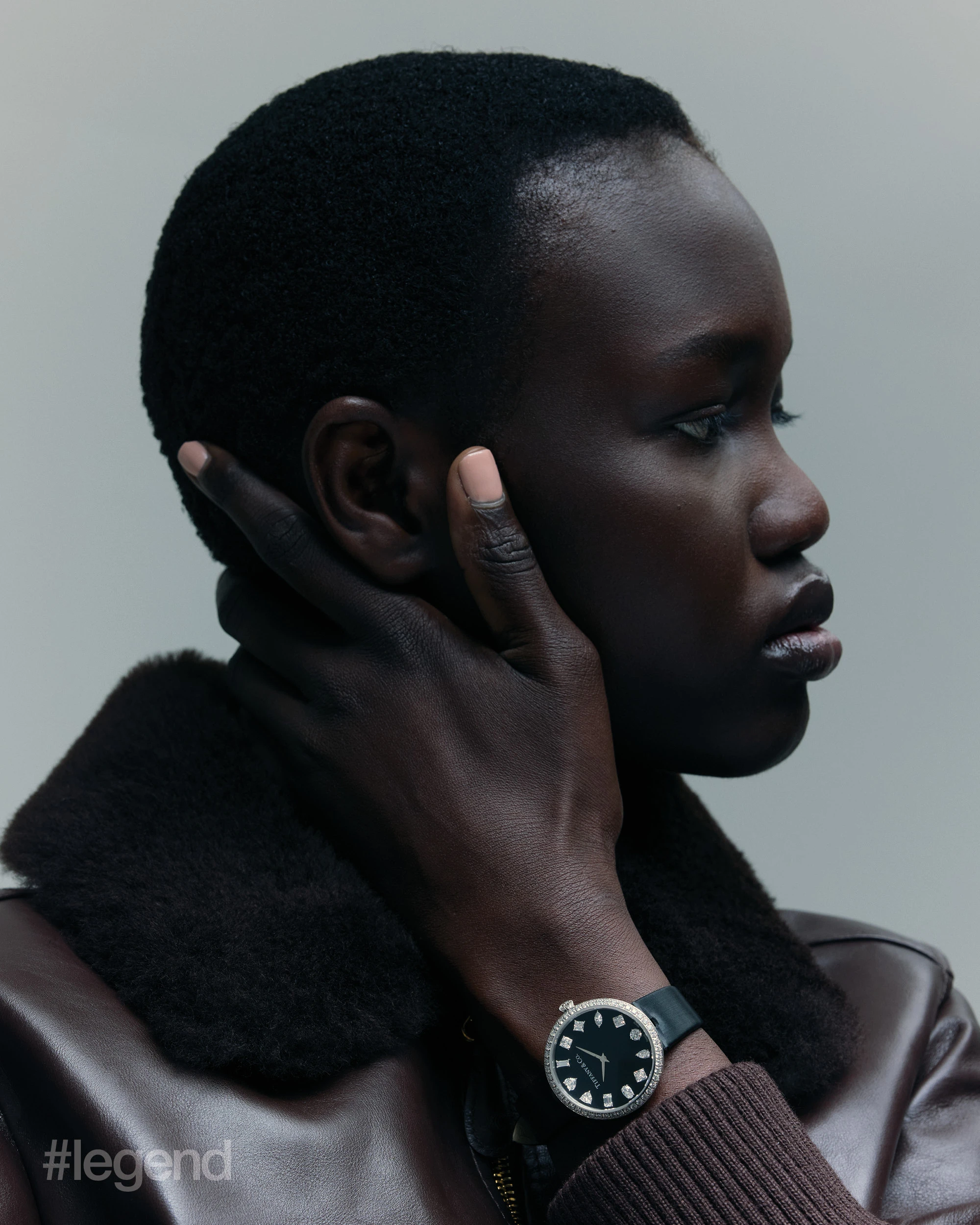 Brown leather jacket _ Celine; Tiffany Eternity round watch _ Tiffany & Co.
