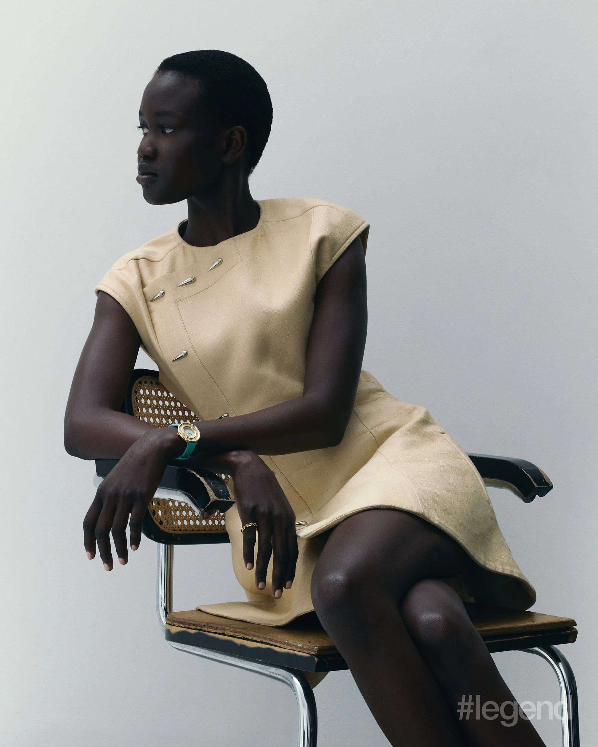 Yellow dress _ Louis Vuitton; Tiffany Rope watch and Tiffany HardWear Micro Link Ring in yellow gold _ Tiffany & Co.