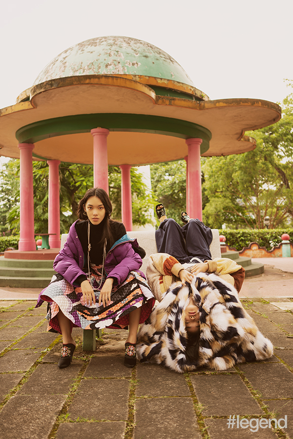 On Layla [left] Black turtleneck, purple puffer coat and printed quilted skirt_Emilio Pucci; Necklace_Chanel; Black jewelled mules_Roger Vivier / On Mei Yue [right] White lace blouse, navy bloomers and black patent heels_Gucci; Brown shearling shirt and patchwork shearling jacket_Tod’s; Patchwork faux-fur coat_Givenchy