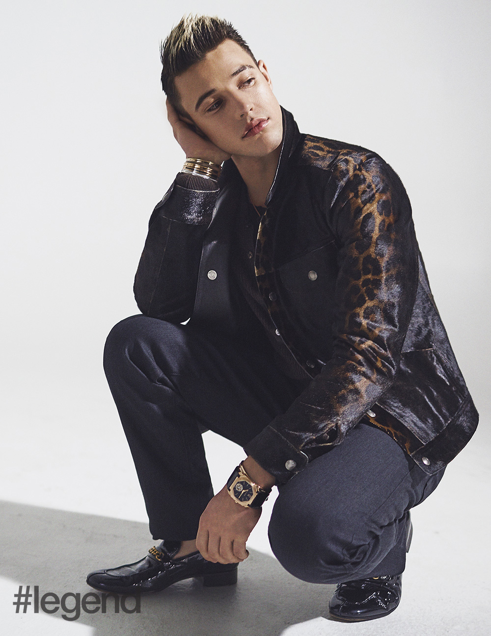 Outfit by Tom Ford and watch and jewellery by Bulgari