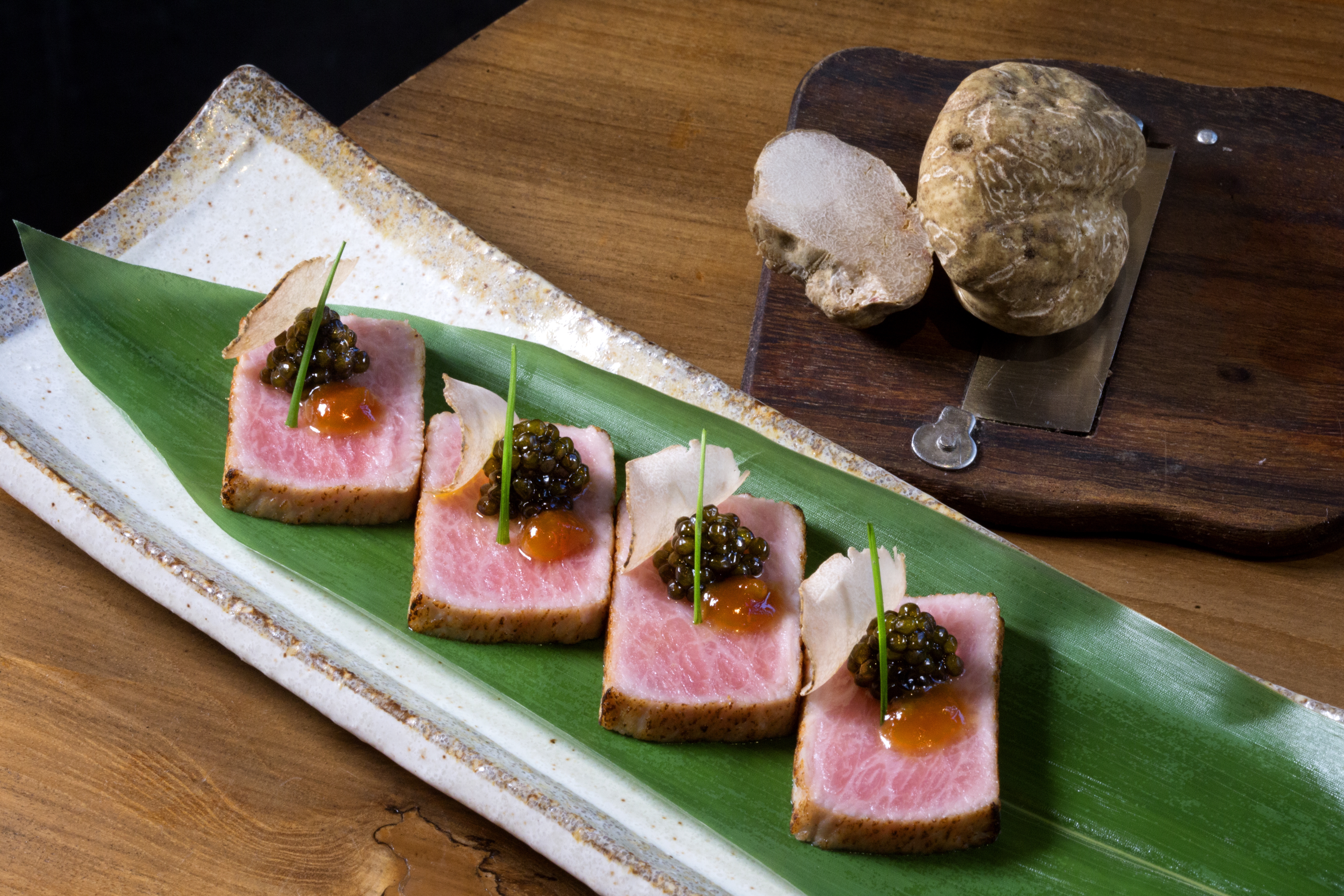 The main hot dishes of Zuma Hong Kong’s White Truffle tasting menu: cabbage papilotte; roasted lobster with garlic, shiso and ponzu butter, and f1 grade niigata 