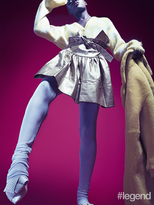 Cardigan and skirt _ Miu Miu; Coat _ Bally; Shoes _ Jimmy Choo; Leggings _ Stylist’s own