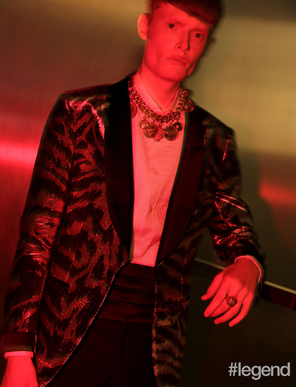 Jacket_Tom Ford; Shirt, trousers, and cummerbund_Brunello Cucinelli; Jewellery_Versace
