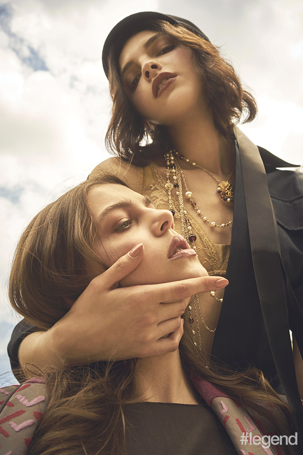 On Clarice (right): Jumpsuit_Céline Bra_Eres Hat and necklace_Chanel. On Amelia (left): Jumpsuit_Max Mara Blazer_Emporio Armani