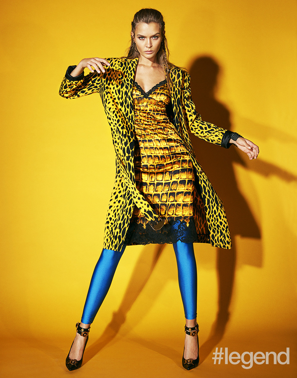 Coat, dress and shoes by Versace, earrings by Lynn Ban and leggings are stylist's own