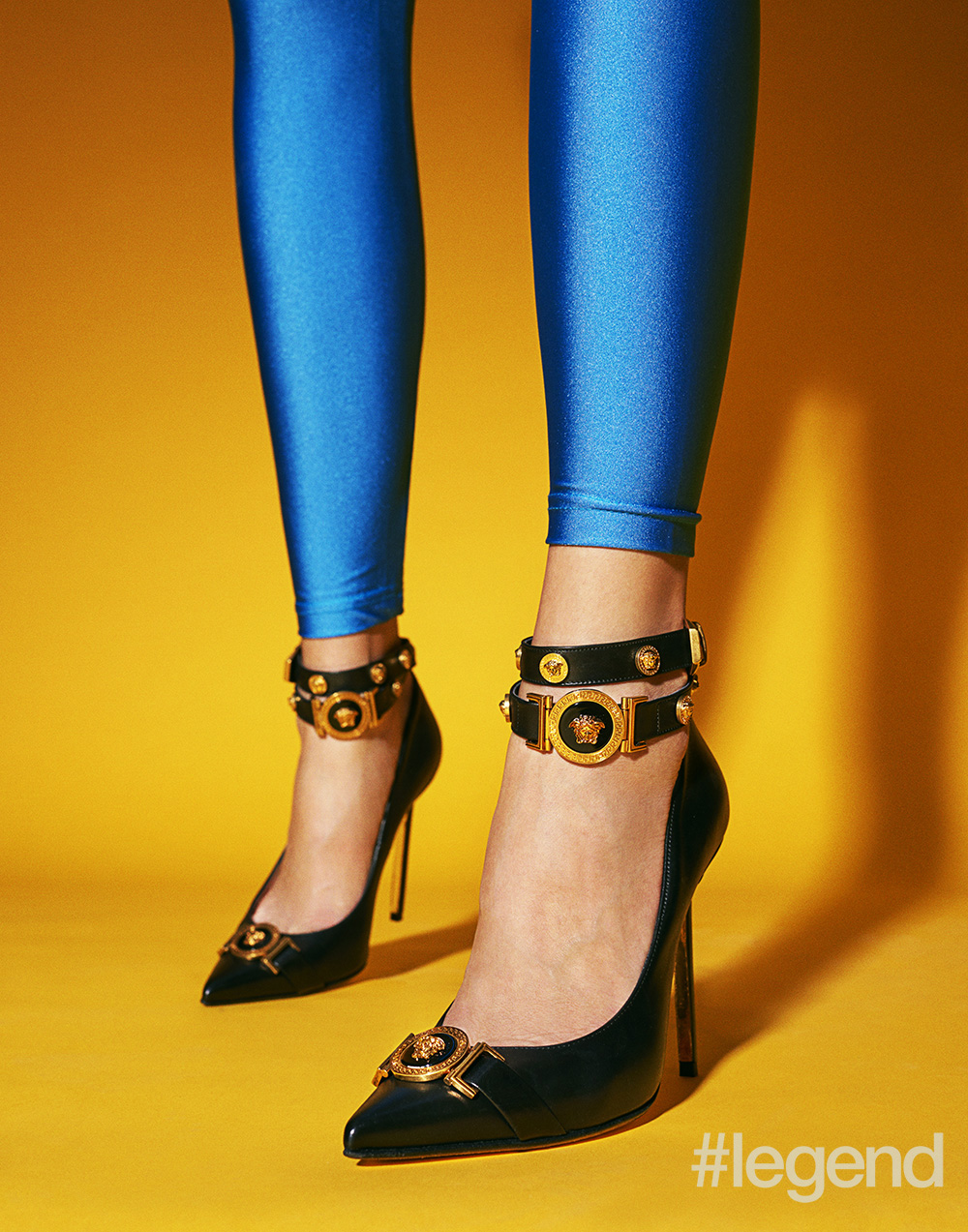 Shoes by Versace and leggings are stylist's own