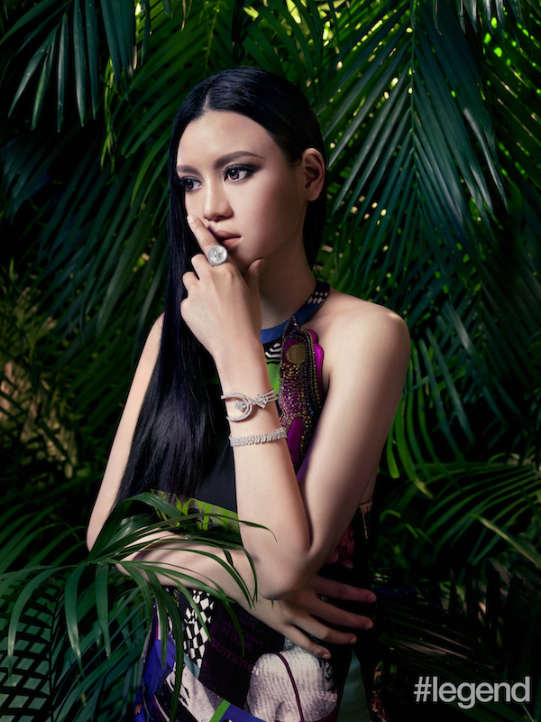 Dress by Versace, ring by APM Monaco Palace Collection, cuff by APM Monaco Magique Collection, bracelet by APM Monaco Festival Collection