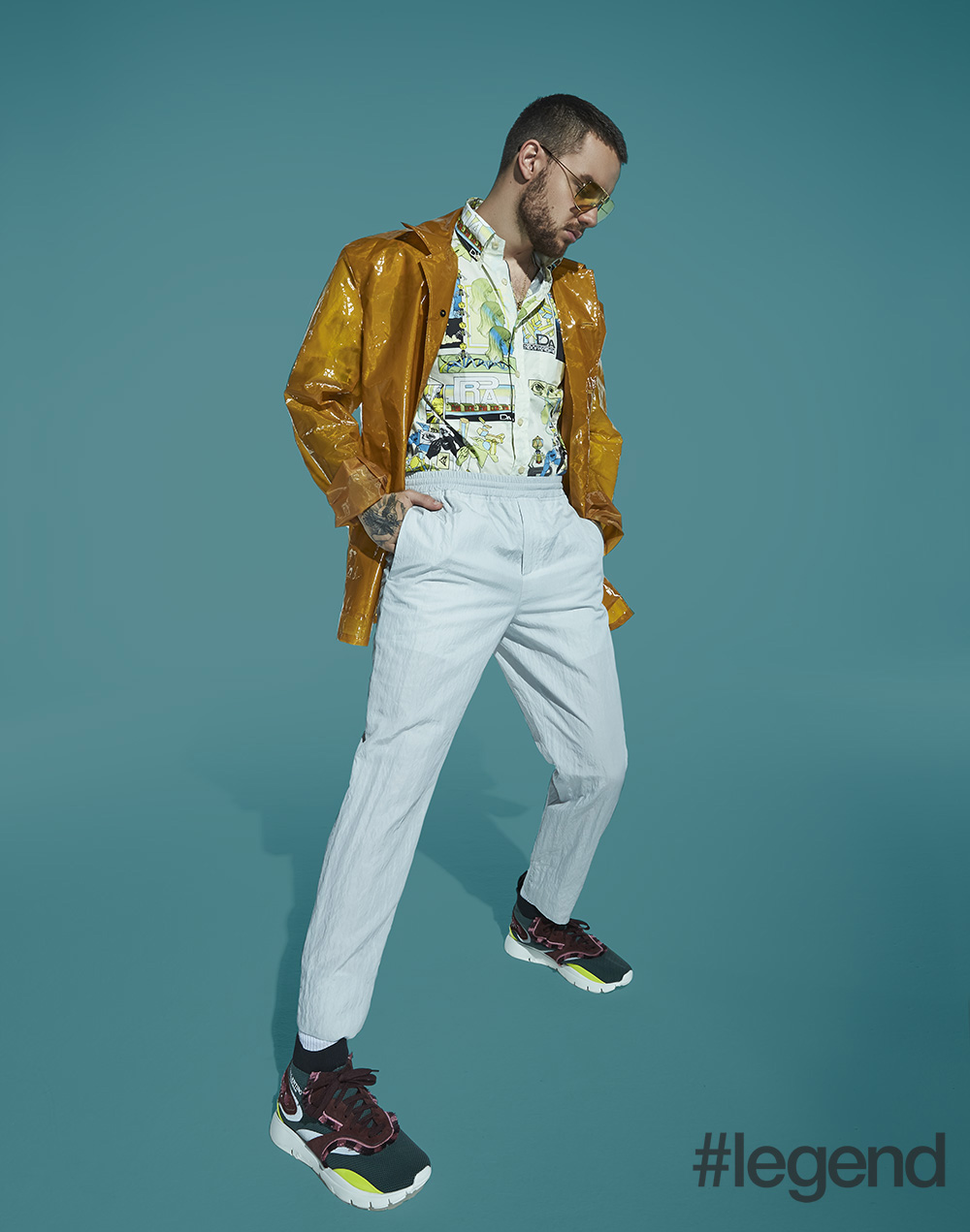 Jacket by Jil Sander from Browns Fashion, shirt by Prada, trousers by Neil Barrett, shoes by Valentino and eyewear is Stylist’s own