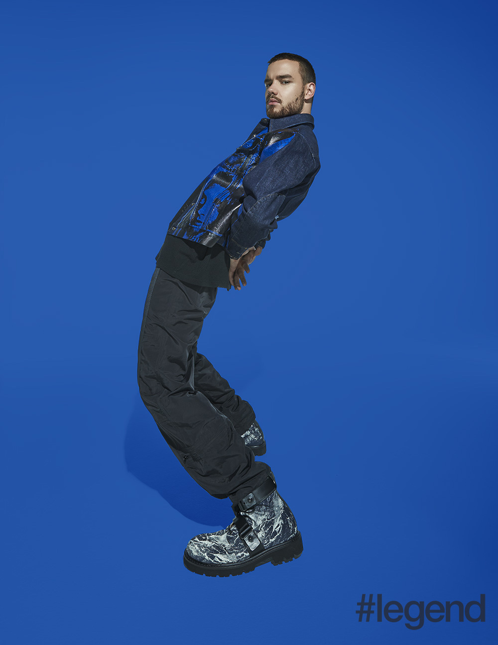 Jacket by Calvin Klein 205W39NYC from Mr Porter, top by Amiri from Mr Porter, trousers by ZDDZ and boots by Emporio Armani