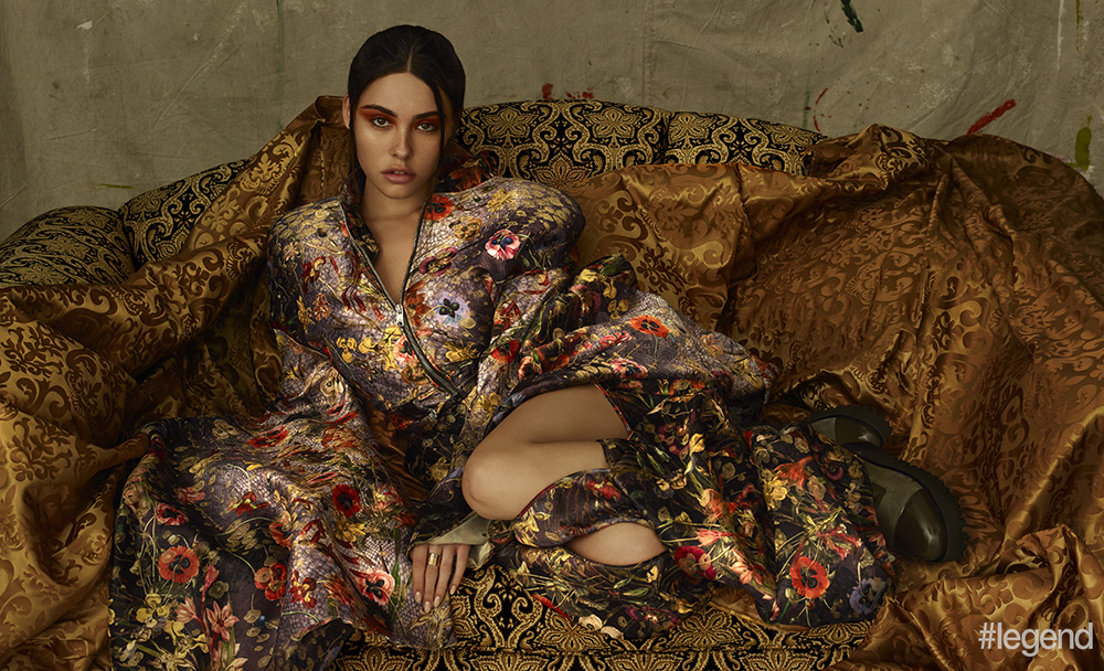 Floral brocade bomber jacket and slit pants by Kaimin; lace-up boots by United Nude