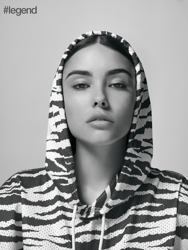 Orange and white zebra patterned hoodie by Joyrich 