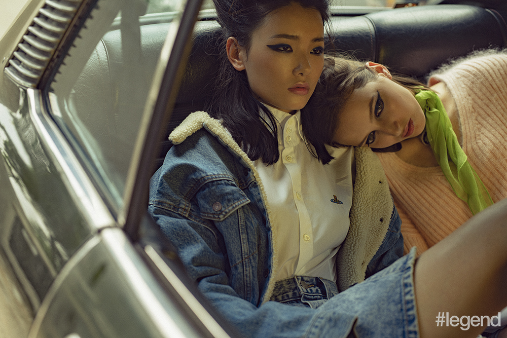 On Hou Jing: Shearling lined denim coat and acid-washed denim skirt _ Levi’s  White shirt _Vivienne Westwood and On Laisan: Pink mohair sweater _ 3.1 Phillip Lim Silk scarf _ Miu Miu Velvet choker _ Atelier Swarovski by Tabitha Simmons 