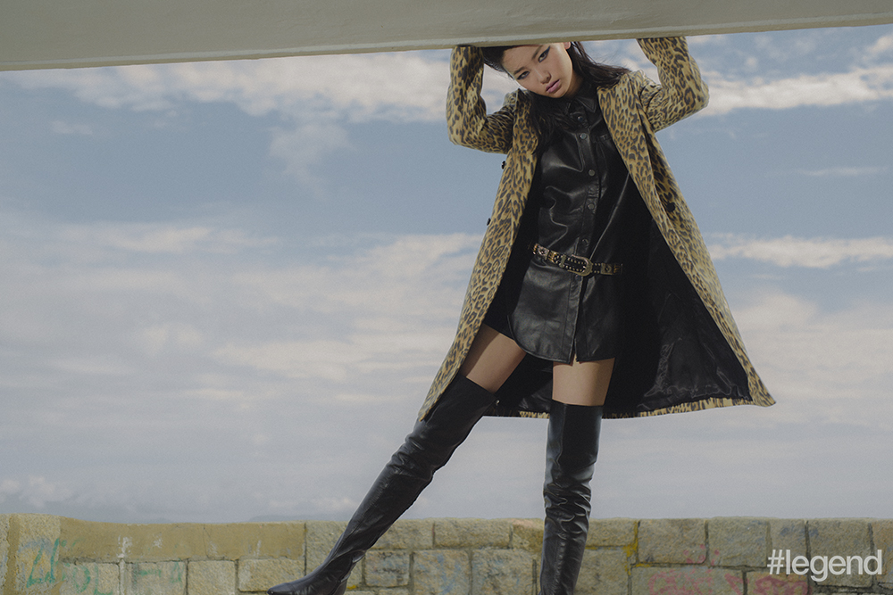 On Hou Jing: Leopard coat _ Claudie Pierlot Leather shirt dress _ Maje Belt _ Toga Archives, available from Vestiaire Collective Boots _ Chanel