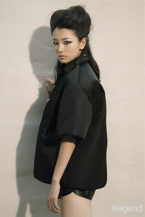 On Hou Jing: Men’s puffer short-sleeve shirt _ Prada Leather shorts _ Yves Saint Laurent