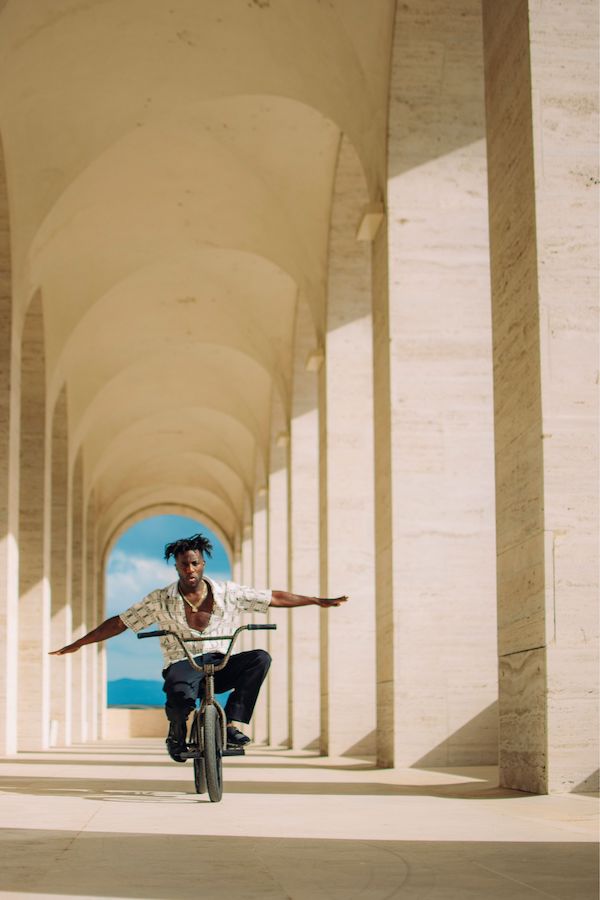 Nigel Sylvester in the Palazzo della Civilità Italiana's Arcade (courtesy of F IS FOR... FENDI)