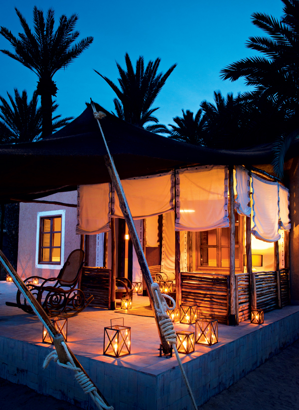 Sahara desert architecture at La Maison de l’Oasis captures the cool of a palm grove