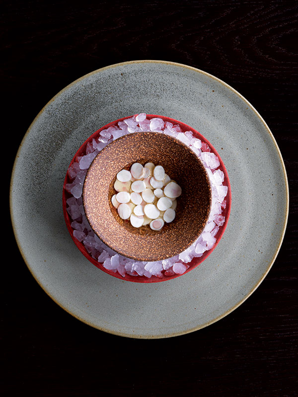 Unripe macadamia and spanner crab (Credit: Jason Loucas)
