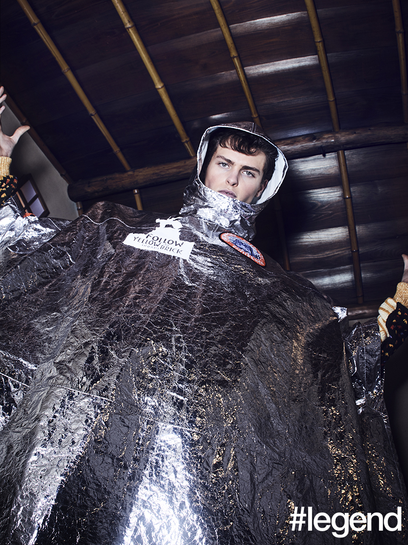 Foil laminated leather poncho with beaded badges _ Louis Vuitton