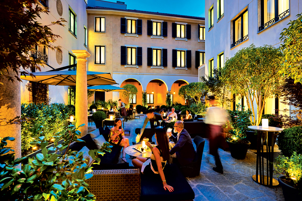 Enjoy aperitivo in the bistro's courtyard