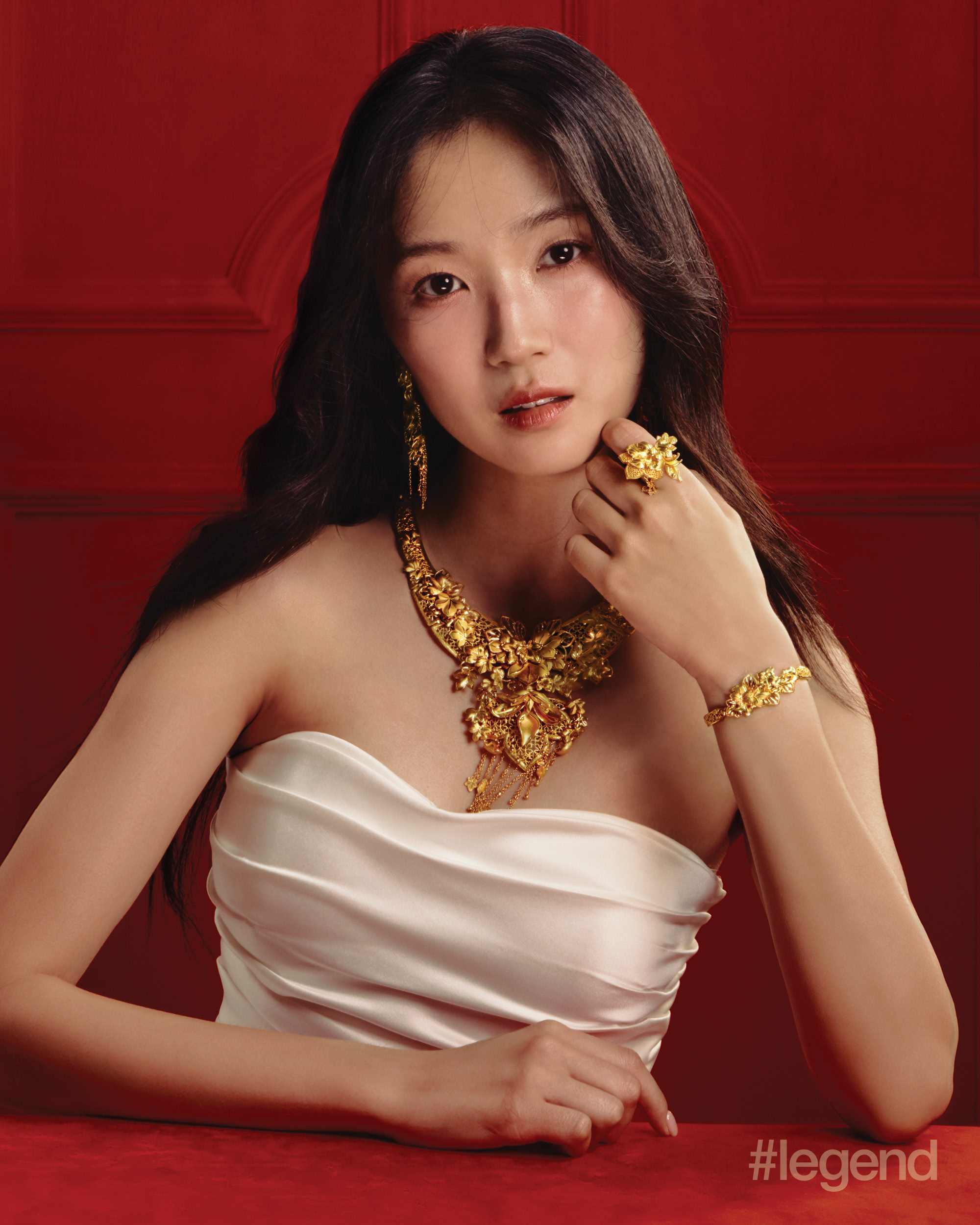 White strapless gown _ The Wedding Gown; Bond To Love Collection earrings, necklace, bangle and ring in pure gold _ Chow Tai Fook