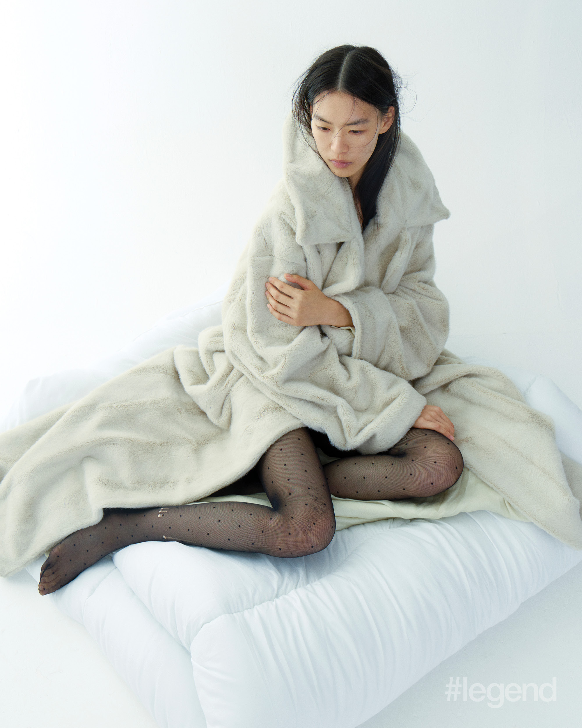 Beige coat and black polka dot tights _ Balenciaga