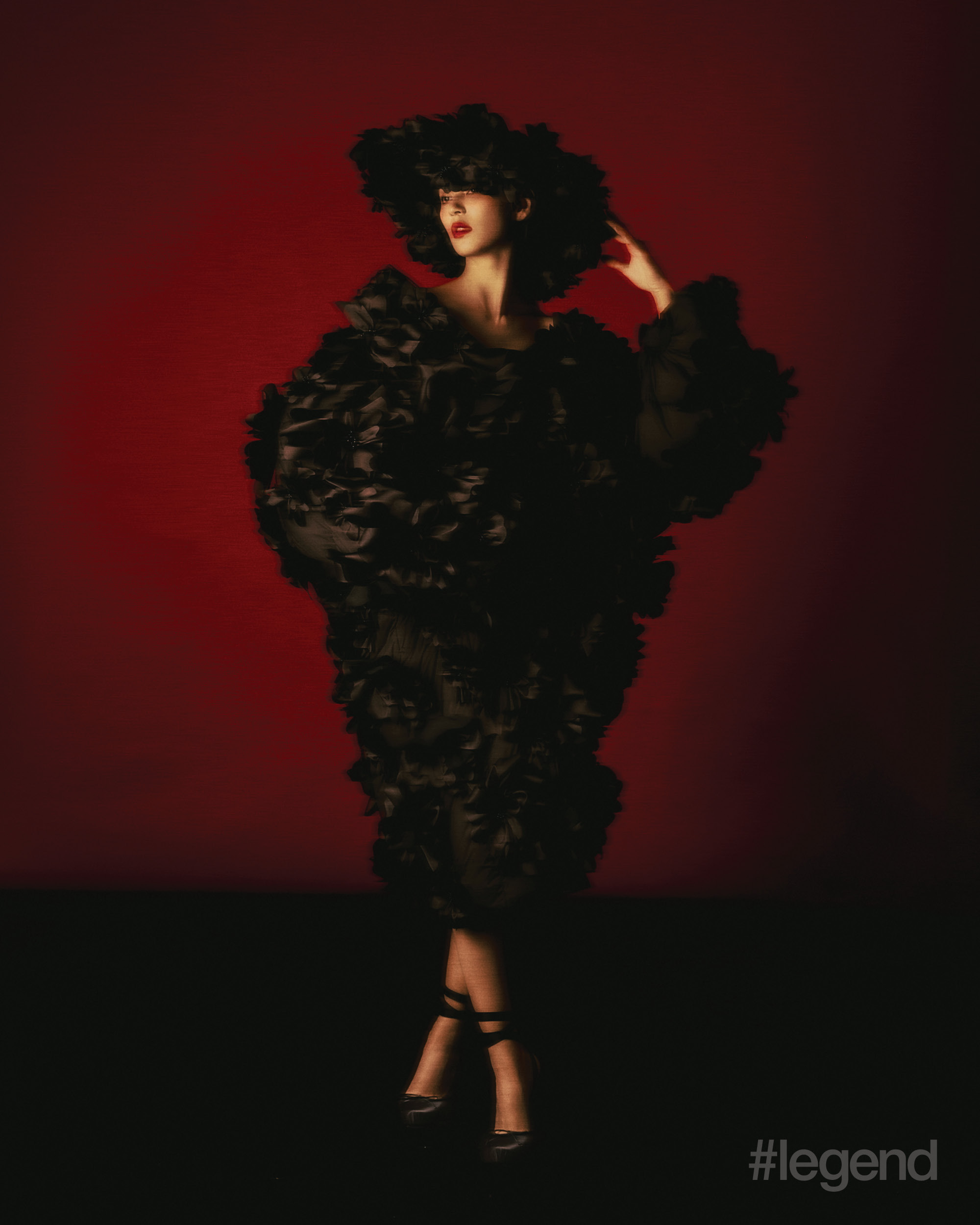 Flower hat, Puffy jacket _ Chen Peng; Black dress _ Giorgio Armani; Black cassia lace up heels _ Christian Louboutin