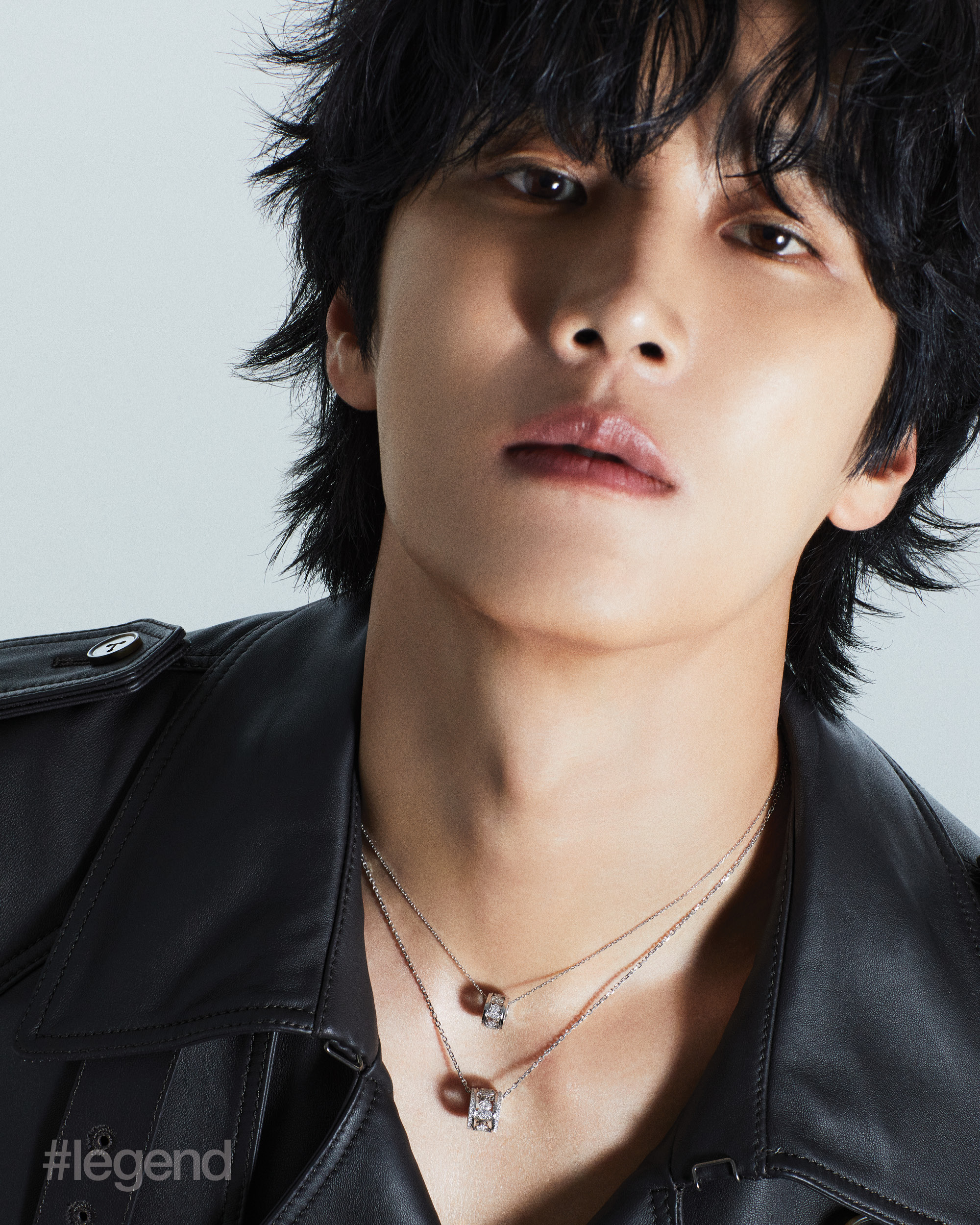 Wulu Eternity necklaces in 18k white gold and diamonds _ Qeelin; Black double-breasted leather jacket _ Tod’s
