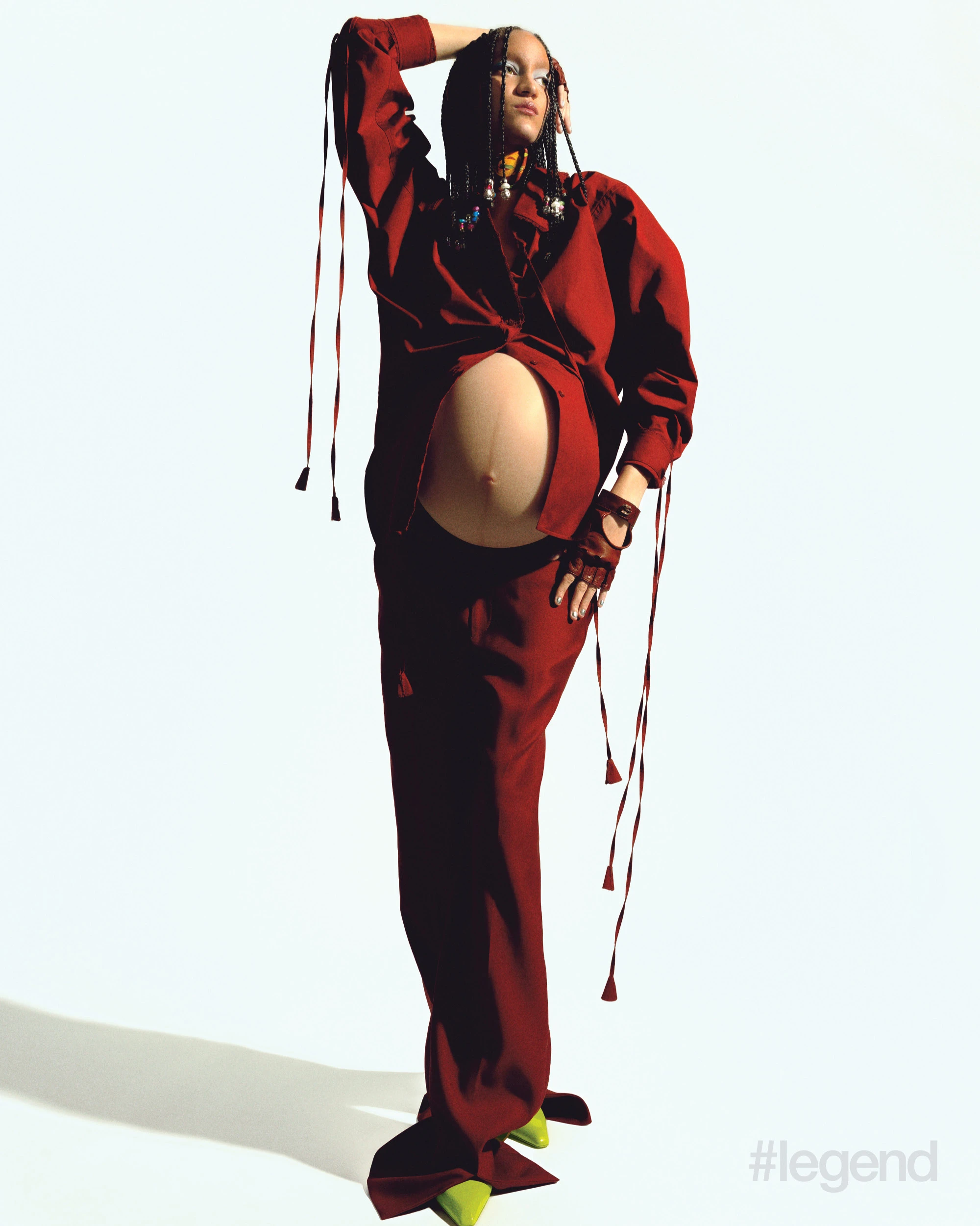 Red shirt, trousers, printed scarf and gloves, and lime green heels _ Gucci